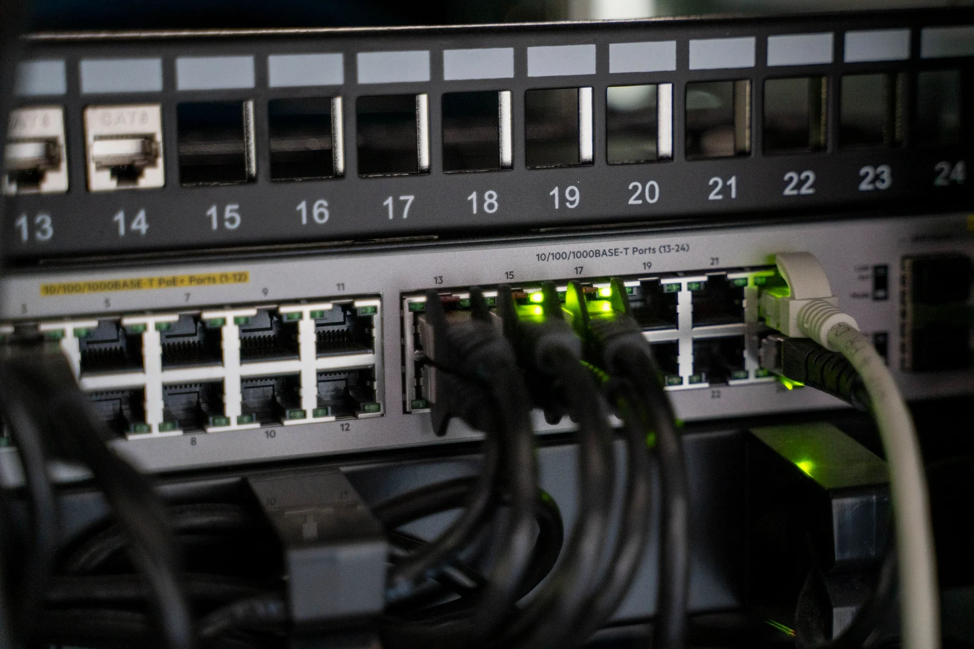 Close-up of business network switch and patch panel connections